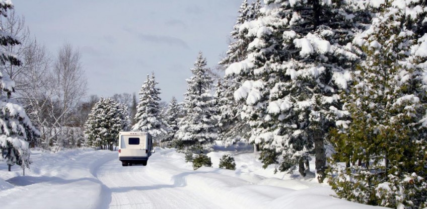 RV In Snowy Road